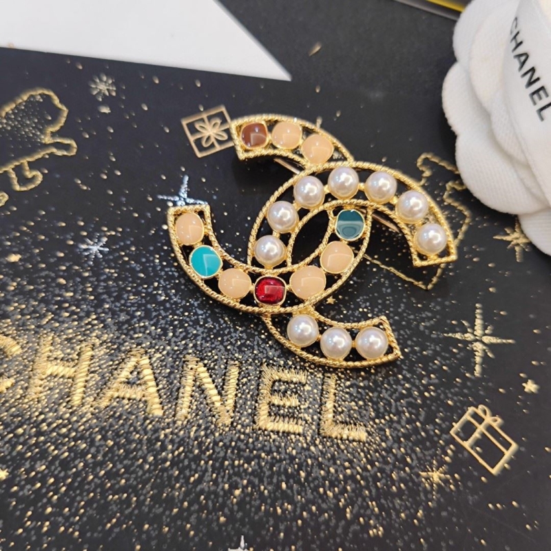 Ch**el brooches